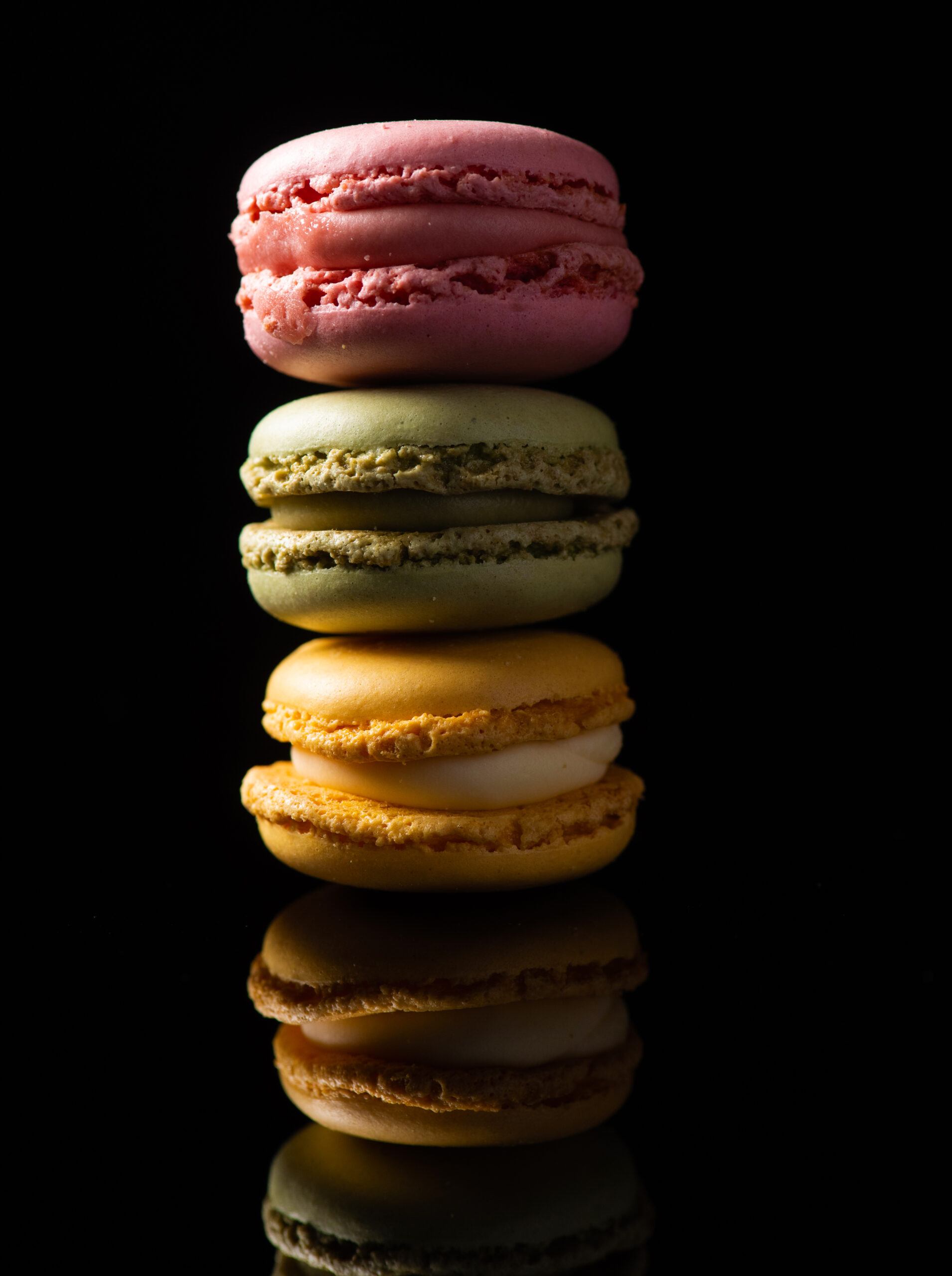 Macarons, Colorful Horizontal Stack of Macarons, isolated on bla